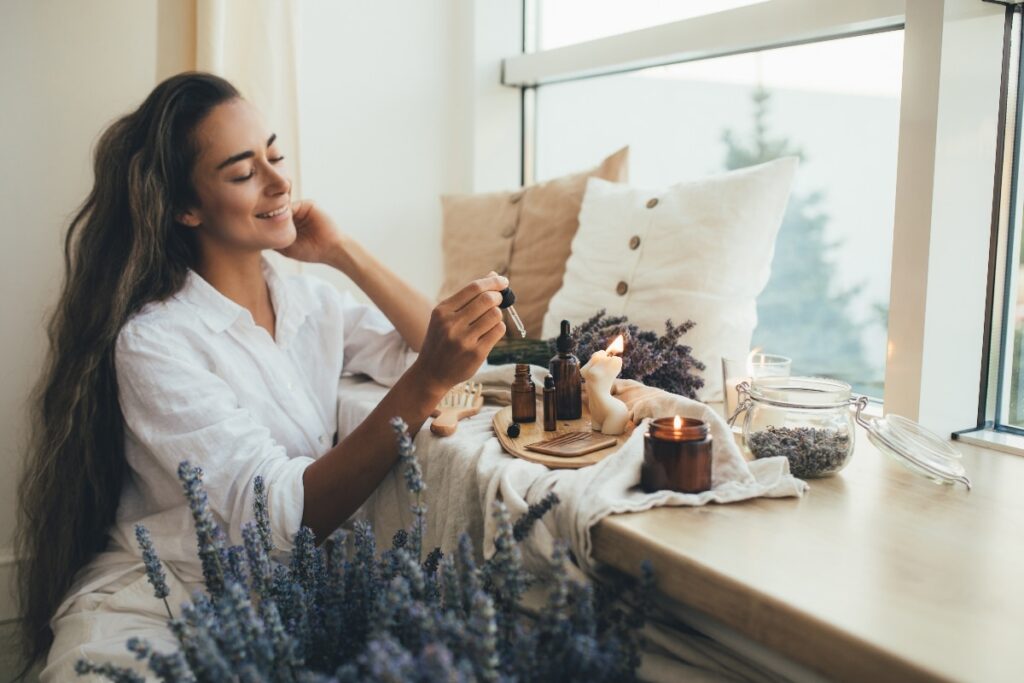 Woman relaxing in her at-home wellness room